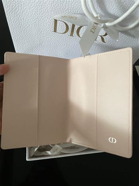 christian dior passport holder pink.